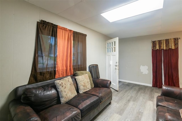 8033 Winfield Ave, Saint Louis, MO 63114 - living room with wood finished floors and baseboards