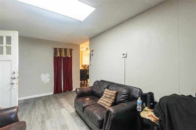 8033 Winfield Ave, Saint Louis, MO 63114 - living room featuring wood finished floors