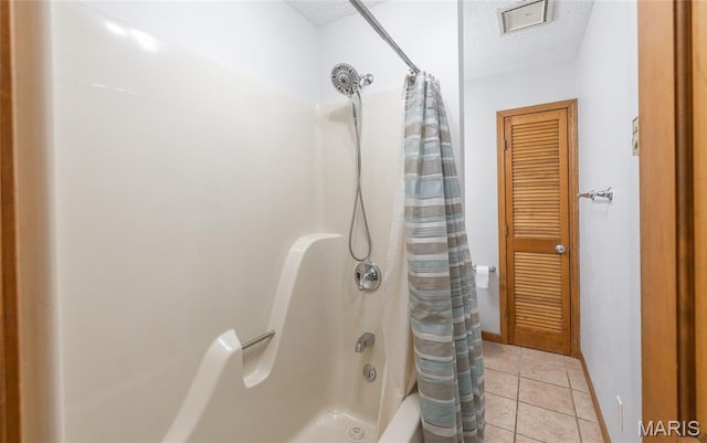 13399 S US Highway 63, Rolla, MO 65401 - full bathroom with shower / bathtub combination with curtain, a textured ceiling, tile patterned flooring, and baseboards