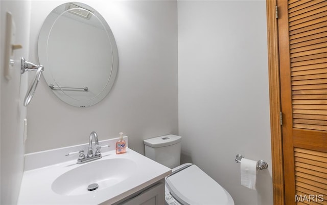 13399 S US Highway 63, Rolla, MO 65401 - bathroom featuring toilet, vanity, and a closet