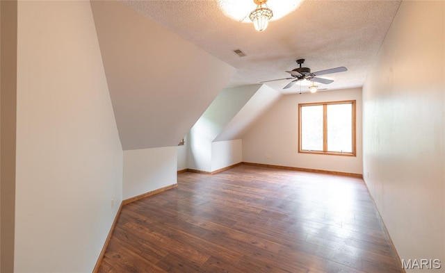 13399 S US Highway 63, Rolla, MO 65401 - bonus room with a textured ceiling, hardwood / wood-style flooring, baseboards, and ceiling fan