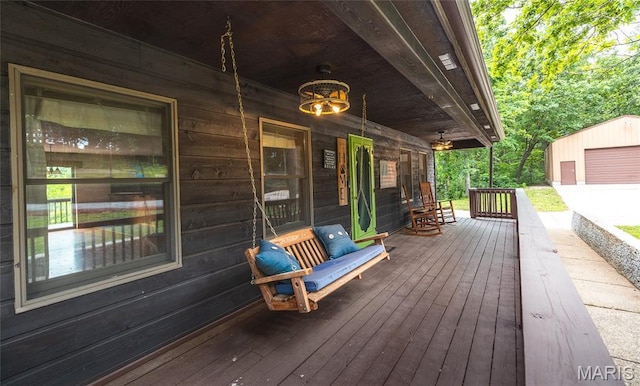 13399 S US Highway 63, Rolla, MO 65401 - wooden porch featuring an outbuilding
