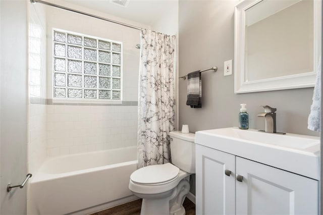 1090 Apache Dr, Florissant, MO 63033 - full bath featuring toilet, vanity, and shower / bath combination with curtain