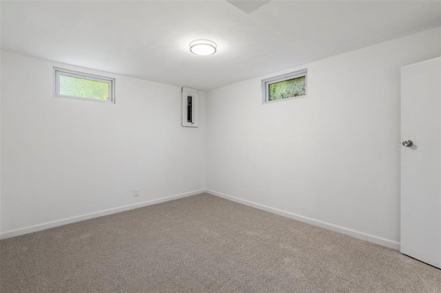 1090 Apache Dr, Florissant, MO 63033 - below grade area featuring carpet and baseboards