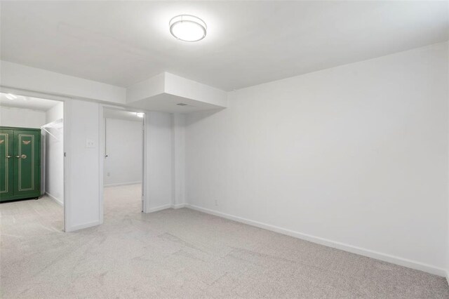 1090 Apache Dr, Florissant, MO 63033 - finished below grade area with carpet and baseboards