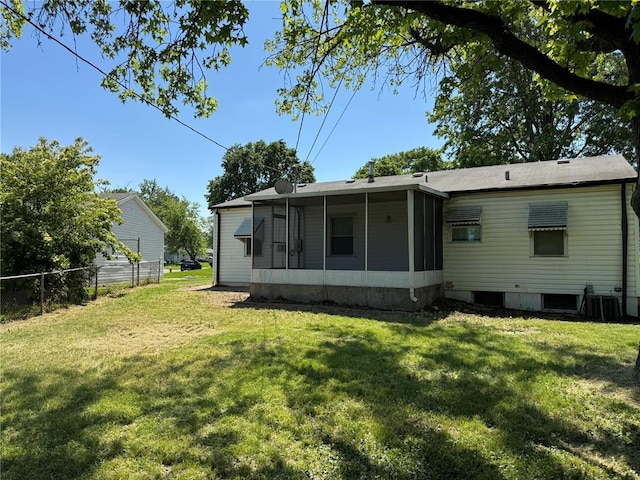1341 Criterion Ave, Saint Louis, MO 63138 - rear view of house with a sunroom