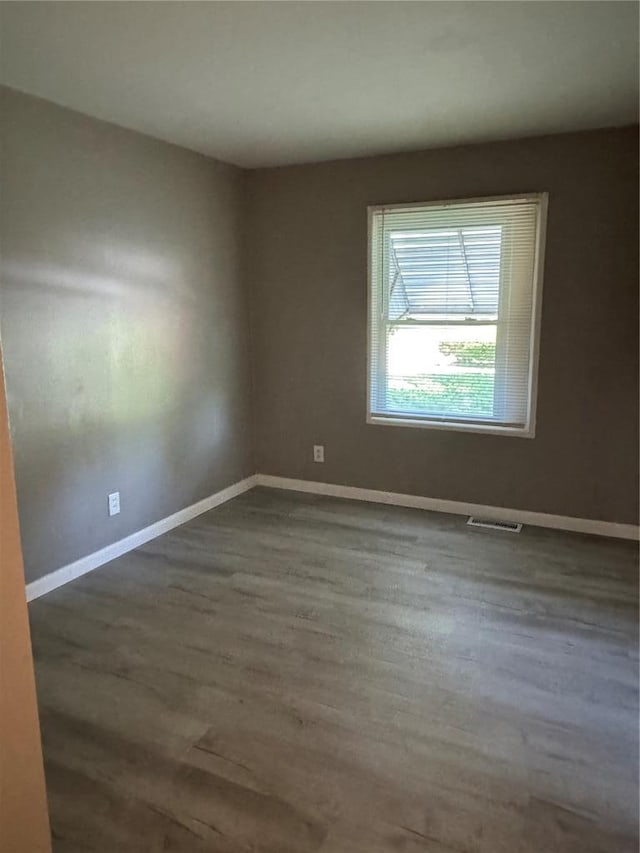 1341 Criterion Ave, Saint Louis, MO 63138 - empty room featuring wood finished floors and baseboards