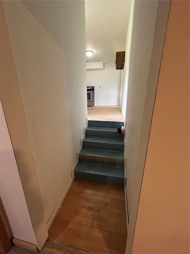 21008 W State Highway 47, Lonedell, MO 63060 - stairs with wood finished floors and baseboards