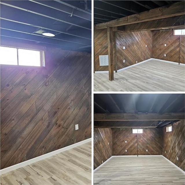 10619 Alliance Dr, Saint Louis, MO 63136 - staircase featuring wooden walls and wood finished floors