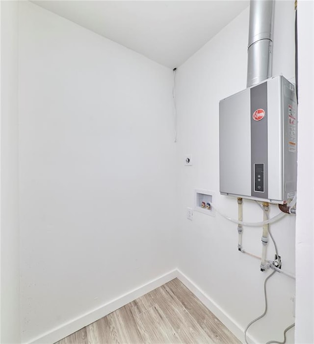 2613 Hillsboro Valley Park Rd, High Ridge, MO 63049 - laundry area with washer hookup, electric dryer hookup, light wood-type flooring, baseboards, and water heater