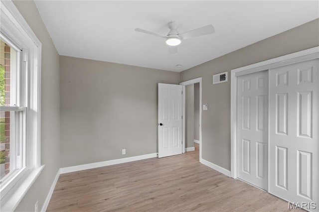 8364 Fullerton Ave, University City, MO 63132 - unfurnished bedroom featuring light wood finished floors, a closet, and a ceiling fan