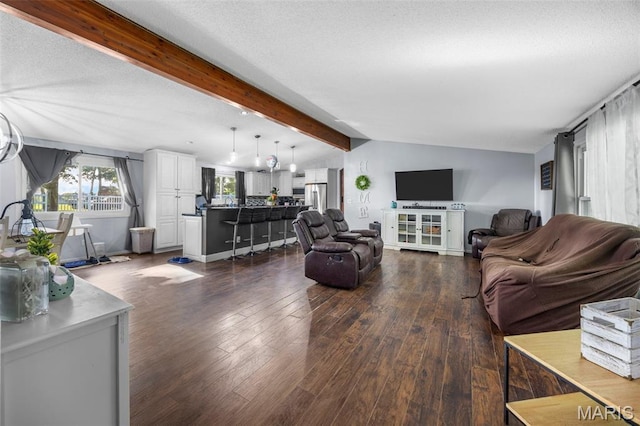 2850 S Hwy W, Winfield, MO 63389 - living area featuring dark wood-style floors and a textured ceiling