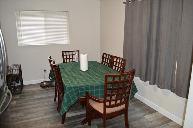 3520 Wismer Rd, Breckenridge Hills, MO 63074 - dining area featuring wood finished floors and baseboards