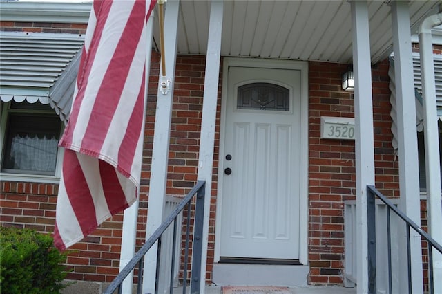 3520 Wismer Rd, Breckenridge Hills, MO 63074 - property entrance featuring brick siding