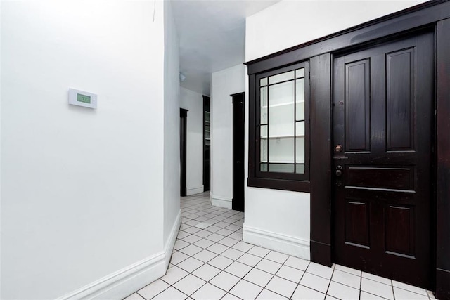 4219 Red Bud Ave, Saint Louis, MO 63115 - foyer featuring baseboards and light tile patterned floors