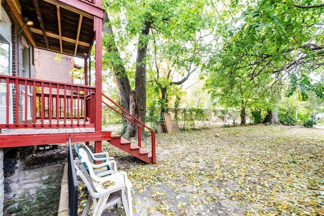 4219 Red Bud Ave, Saint Louis, MO 63115 - view of yard with stairway and a deck