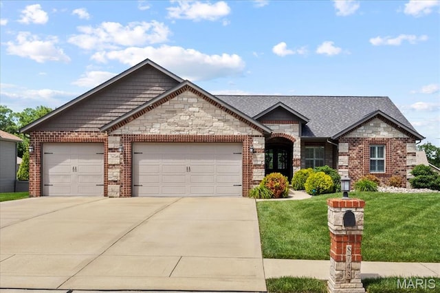 8743 Cardinal Creek Dr, Saint Jacob, IL 62281 - view of front of home featuring an attached garage, concrete driveway, a front lawn, brick siding, and stone siding