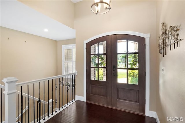 8743 Cardinal Creek Dr, Saint Jacob, IL 62281 - entryway featuring french doors, wood finished floors, baseboards, and a towering ceiling