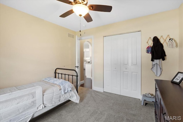 8743 Cardinal Creek Dr, Saint Jacob, IL 62281 - carpeted bedroom featuring arched walkways, a closet, and a ceiling fan