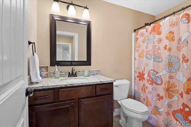 8743 Cardinal Creek Dr, Saint Jacob, IL 62281 - bathroom with vanity, toilet, and a shower with shower curtain