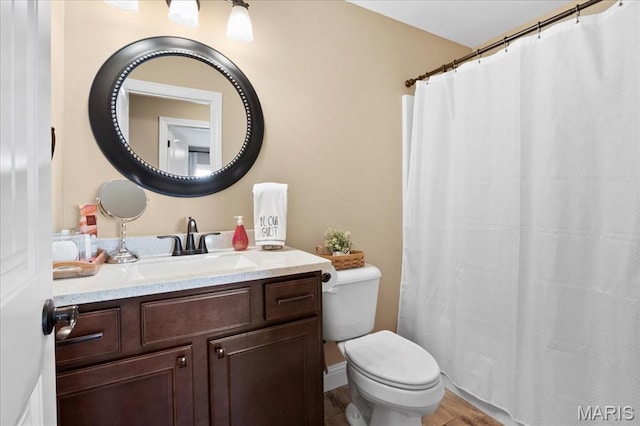 8743 Cardinal Creek Dr, Saint Jacob, IL 62281 - bathroom with toilet, vanity, a shower with shower curtain, and wood finished floors