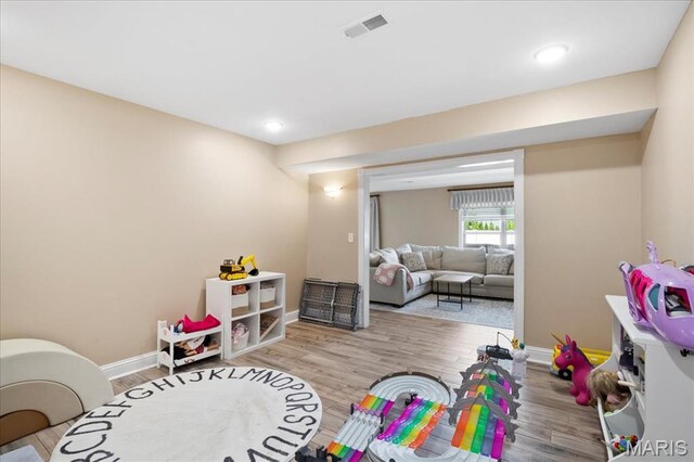 8743 Cardinal Creek Dr, Saint Jacob, IL 62281 - rec room featuring baseboards, wood finished floors, and recessed lighting
