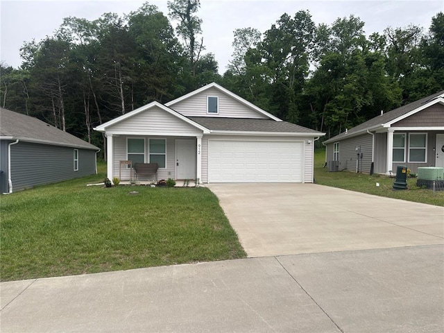 912 Osage Villa Ct, Villa Ridge, MO 63089 - view of front of house with covered porch, concrete driveway, a front lawn, an attached garage, and central air condition unit