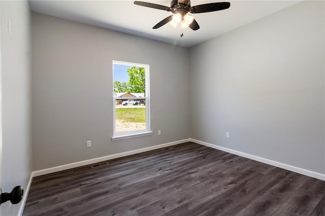 14682 N State Highway 21, Cadet, MO 63630 - empty room with dark wood-type flooring, baseboards, and a ceiling fan