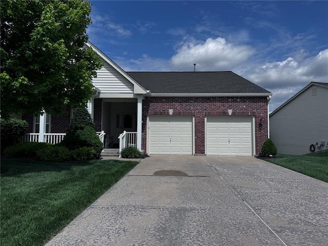 844 Waterford Villas Dr, Lake St Louis, MO 63367 - view of front of home featuring brick siding, concrete driveway, an attached garage, and a front yard