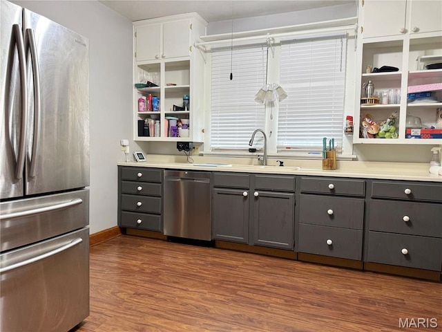 1106 Raab Ave, Belleville, IL 62220 - kitchen with appliances with stainless steel finishes, gray cabinetry, open shelves, a sink, and dark wood finished floors