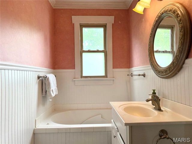 1106 Raab Ave, Belleville, IL 62220 - bathroom with wainscoting, vanity, healthy amount of natural light, a garden tub, and crown molding