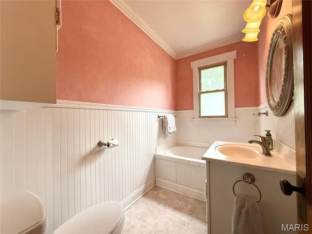 1106 Raab Ave, Belleville, IL 62220 - bathroom featuring toilet, a garden tub, vanity, tile patterned floors, and wainscoting