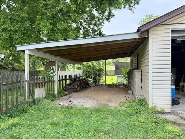 1106 Raab Ave, Belleville, IL 62220 - view of parking featuring a carport and driveway