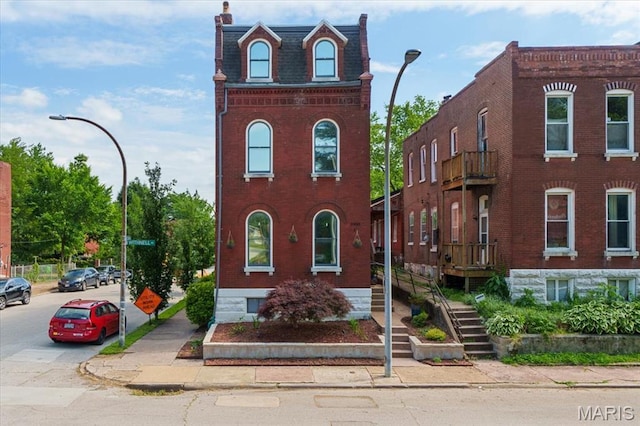2000 Withnell Ave, Saint Louis, MO 63118 - victorian home featuring brick siding, mansard roof, and a chimney