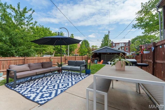 2000 Withnell Ave, Saint Louis, MO 63118 - fenced backyard with outdoor lounge area, a patio, and outdoor dining area