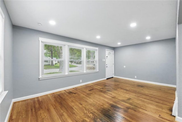 1901 Bainbridge Dr, Saint Louis, MO 63133 - spare room featuring wood finished floors, baseboards, and recessed lighting