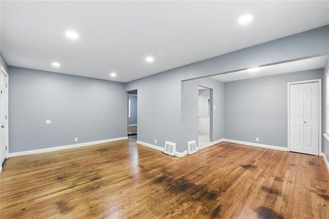 1901 Bainbridge Dr, Saint Louis, MO 63133 - unfurnished room featuring wood finished floors, recessed lighting, and baseboards