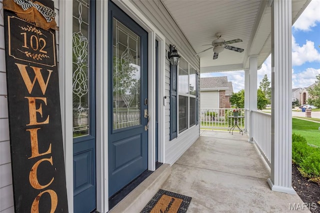 102 Riparian Dr, Ofallon, MO 63368 - doorway to property with covered porch and ceiling fan