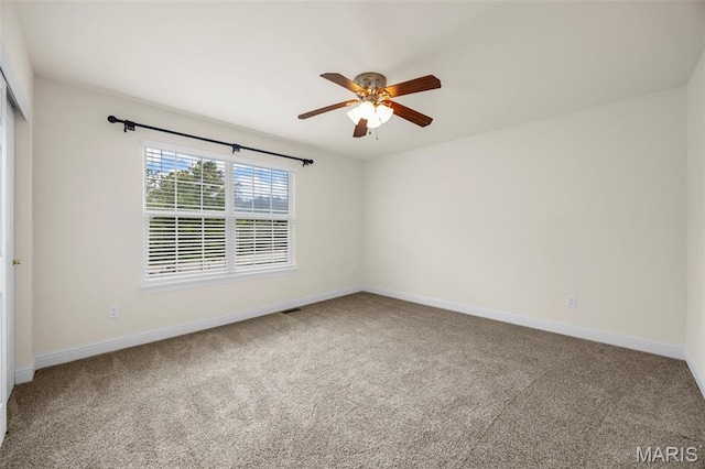 102 Riparian Dr, Ofallon, MO 63368 - unfurnished room featuring ceiling fan, carpet, and baseboards