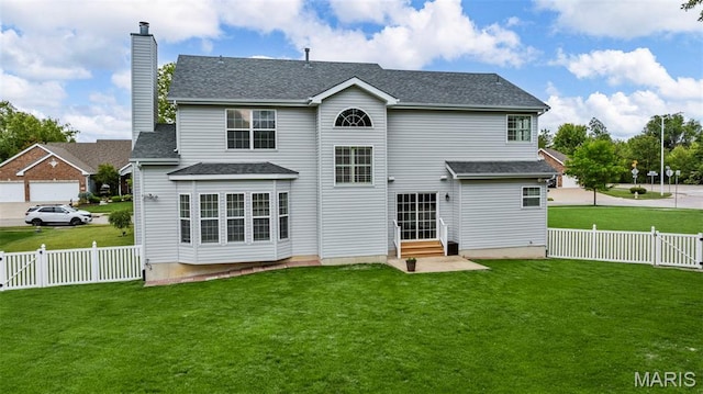 102 Riparian Dr, Ofallon, MO 63368 - back of house featuring entry steps, a chimney, a gate, and roof with shingles