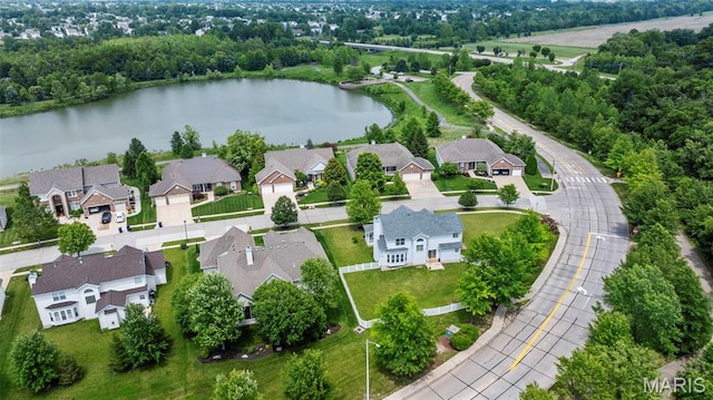102 Riparian Dr, Ofallon, MO 63368 - aerial view of residential area featuring a nearby body of water