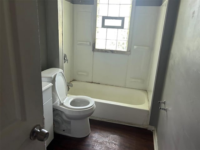 3838 Avondale Ave, Northwoods, MO 63121 - bathroom with wood finished floors, toilet, shower / tub combination, and vanity