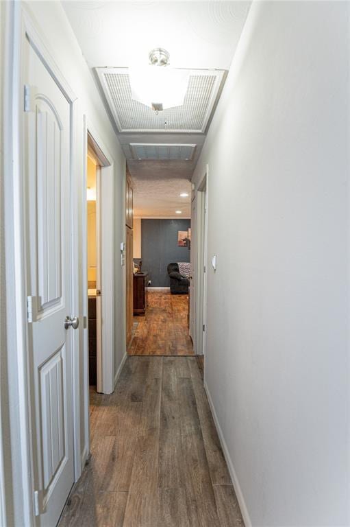 606 N Charles Ave, St James, MO 65559 - hallway with dark wood-style floors and baseboards