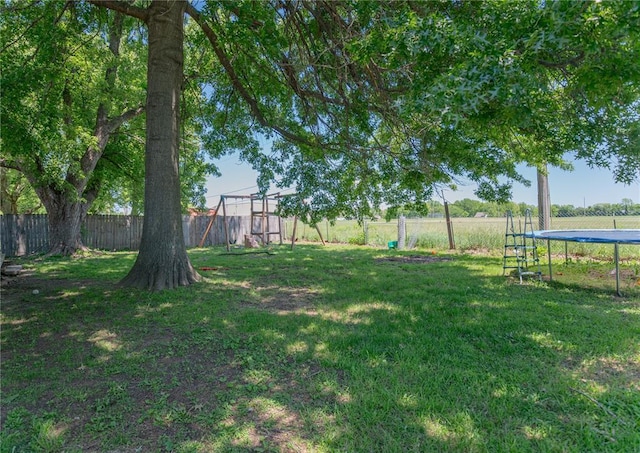 606 N Charles Ave, St James, MO 65559 - view of yard with a trampoline