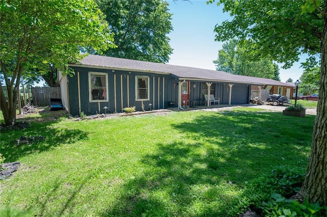 606 N Charles Ave, St James, MO 65559 - view of front of house with an attached garage and board and batten siding