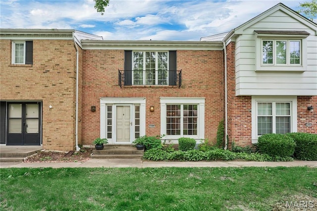 13489 Beaulac Dr, Chesterfield, MO 63141 - view of property with a front yard and brick siding