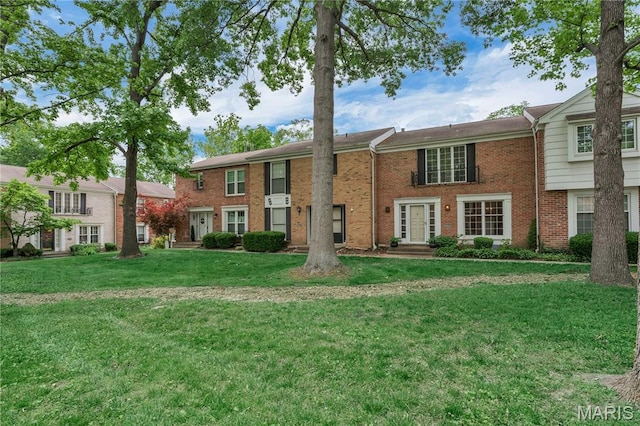 13489 Beaulac Dr, Chesterfield, MO 63141 - townhome / multi-family property with brick siding and a front yard