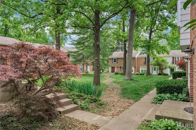 13489 Beaulac Dr, Chesterfield, MO 63141 - view of property's community featuring a yard