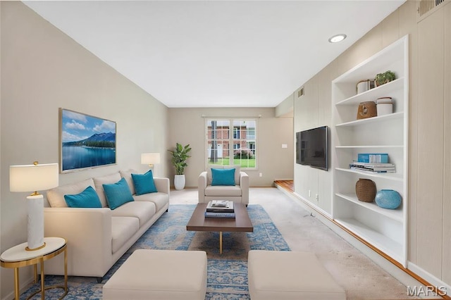 13489 Beaulac Dr, Chesterfield, MO 63141 - living room featuring built in features and baseboards