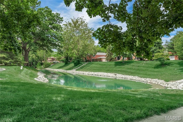 13489 Beaulac Dr, Chesterfield, MO 63141 - view of pool with a water view and a lawn